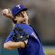 Illustration for article titled Derek Holland Injured His Knee Because His Dog Tripped Him